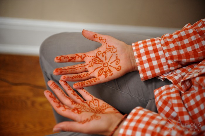 henna tattoos on brides hands (detail)