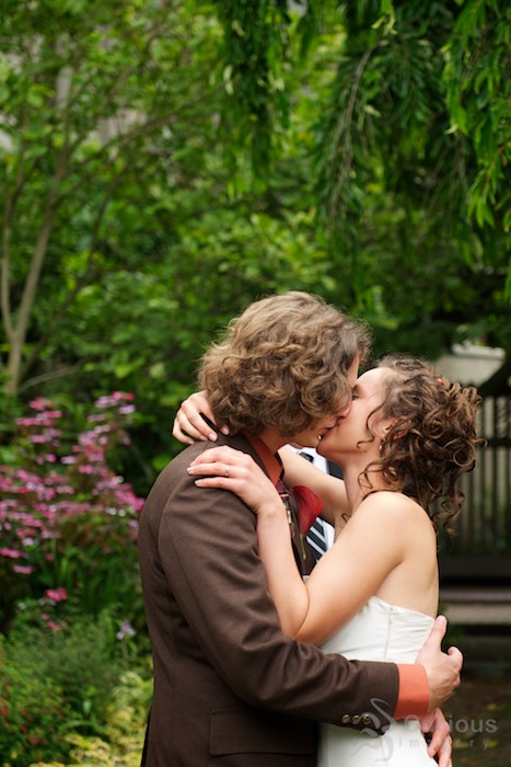 bride and groom kiss