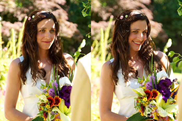 bride smiling at groom while he reads vows