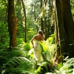 Bride walking in beautiful woods