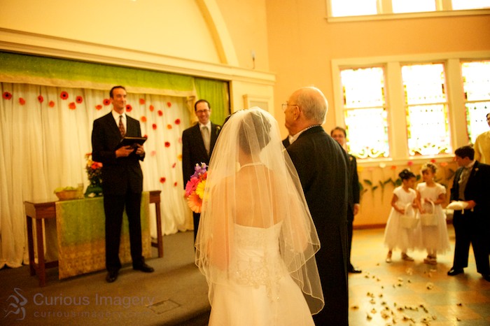 Father presenting bride in wedding ceremony